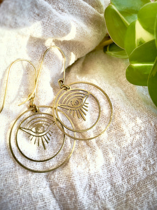 Delicate Eyes in Hoop Earrings
