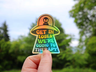 Get In Loser We’re Going to Therapy Spaceship - Holographic Sticker